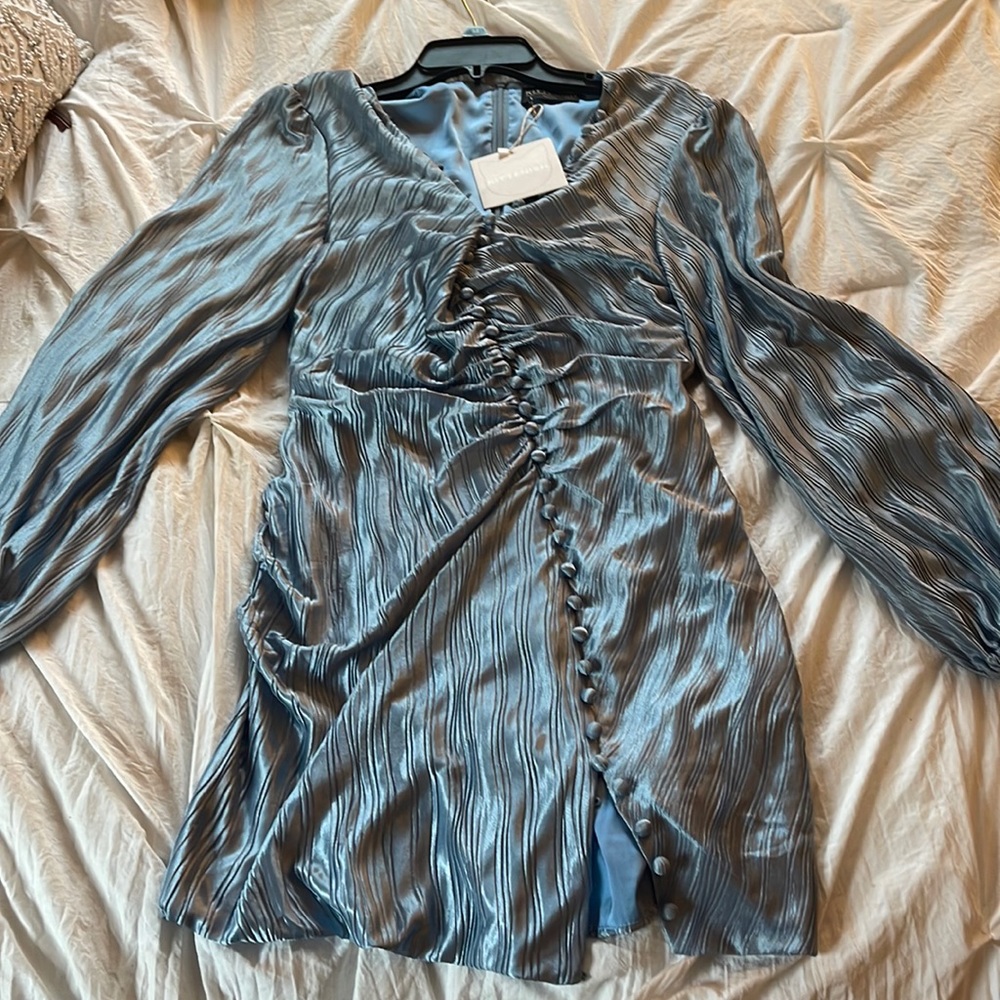 Kittenish blue skies dress size M never worn
